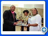Principal Thompson  presenting to Honour Roll student, Salutatorian, Bronthaye Rolle of the Class of 2016 - 490A7557