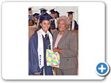 Ashlay Johnson of the SGPAA Class of 2016, receiving a gift from Evangelist Shirley Burrows -490A6580