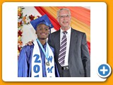 Valedictorian of the WHS Class of 2016, Naaman Rolle, with campus pastor Mr. Schrag - 490A3264