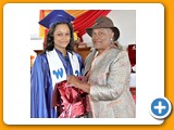  Brittany Ingraham, Salutatorian of the WHS Class of 2016, receiving a gift from Evangelist Shirley Burrows- 490A3289